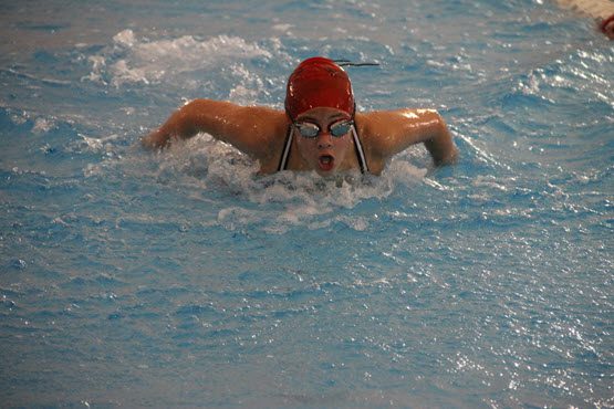 Swimmer coming up for air during the forward stroke.